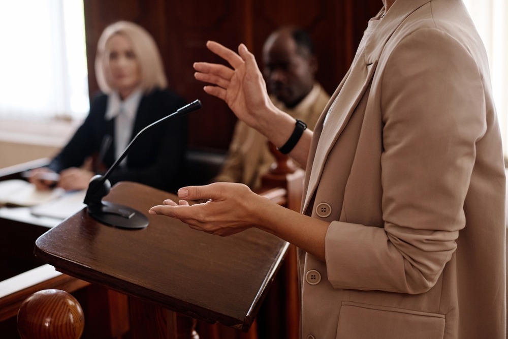 A CPA license defense lawyer represents a client during an administrative hearing.